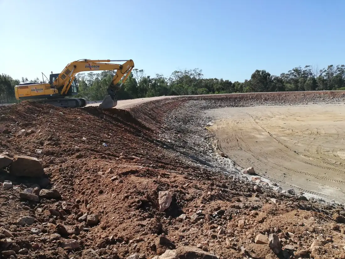 Bulk earthworks levelling a site to the plan